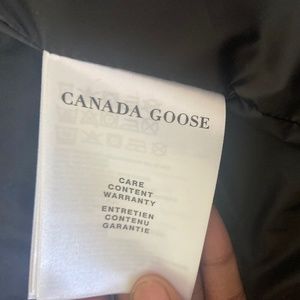 This is a cute pink canda goose jacket NEW NEVER WORE!